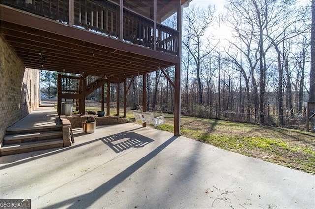 4801 Daniel Mill Rd, Winston, GA 30187 - view of patio / terrace with stairs, a wooden deck, and a view of trees