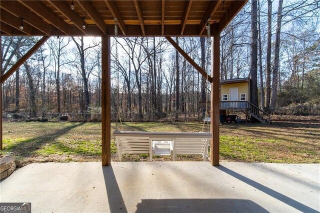 4801 Daniel Mill Rd, Winston, GA 30187 - view of patio featuring stairs and a forest view