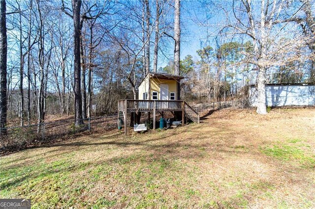 4801 Daniel Mill Rd, Winston, GA 30187 - view of yard featuring stairs, a wooden deck, and a fenced backyard