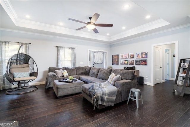 4801 Daniel Mill Rd, Winston, GA 30187 - living area featuring baseboards, a ceiling fan, dark wood-style flooring, and a tray ceiling