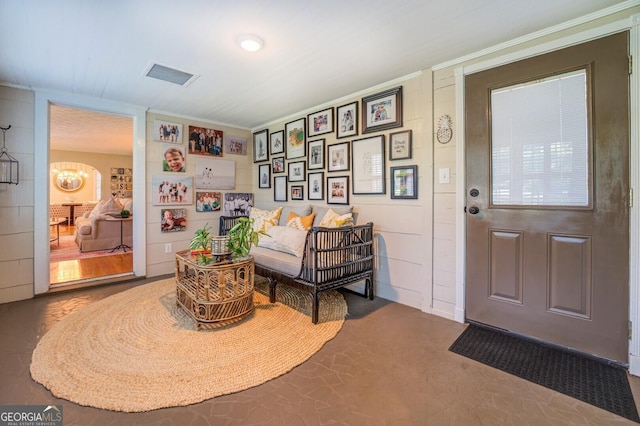 living area featuring a notable chandelier