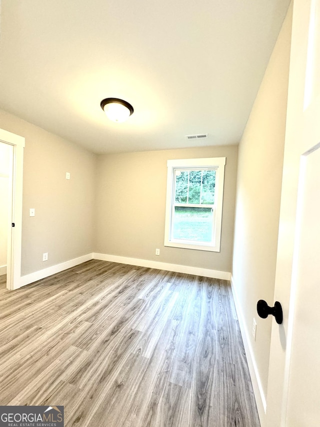 empty room featuring light wood-type flooring