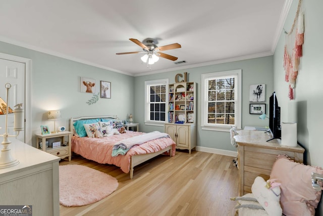 bedroom with crown molding, ceiling fan, and light wood-type flooring