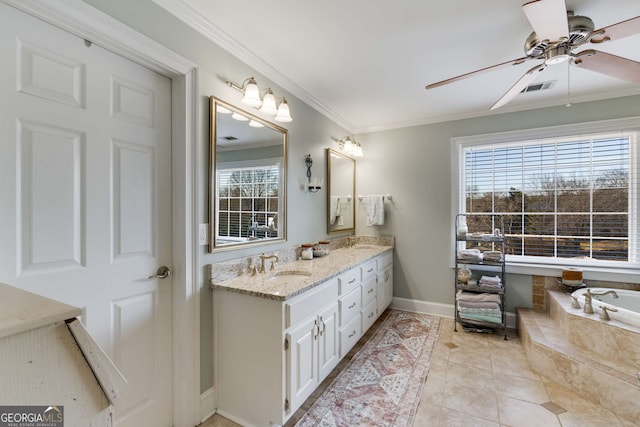 bathroom featuring tiled tub, ceiling fan, tile patterned flooring, vanity, and ornamental molding