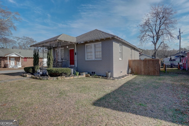 view of front of property with a front lawn and a porch