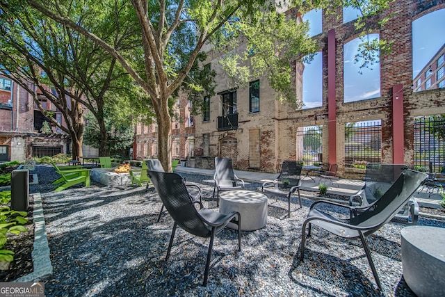 view of patio / terrace with a fire pit