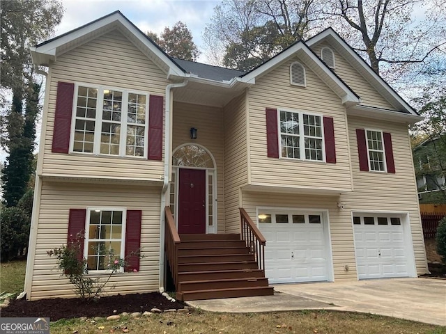 bi-level home featuring a garage