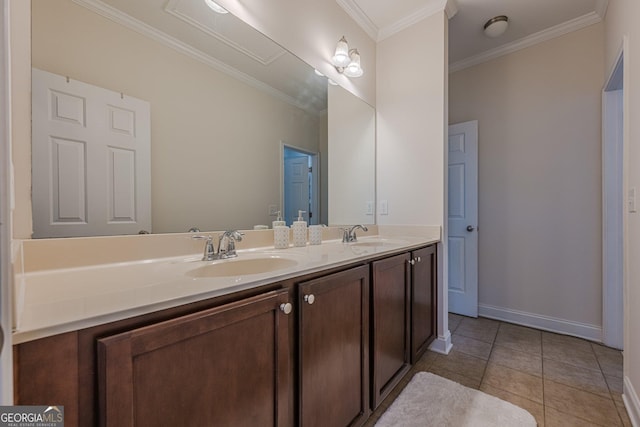 full bathroom with crown molding, double vanity, a sink, tile patterned flooring, and baseboards