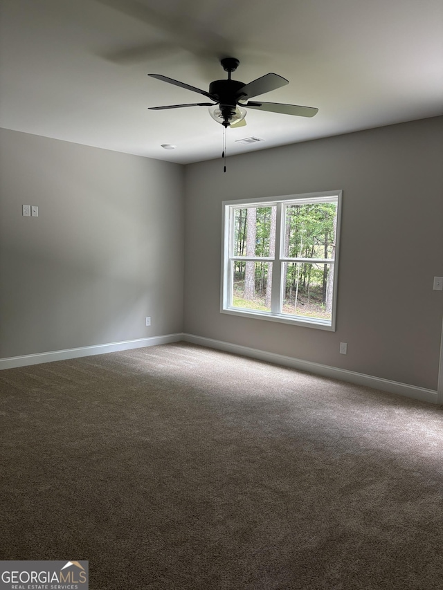 29 Iron Bound Trl, Dallas, GA 30132 - carpeted spare room featuring baseboards and ceiling fan