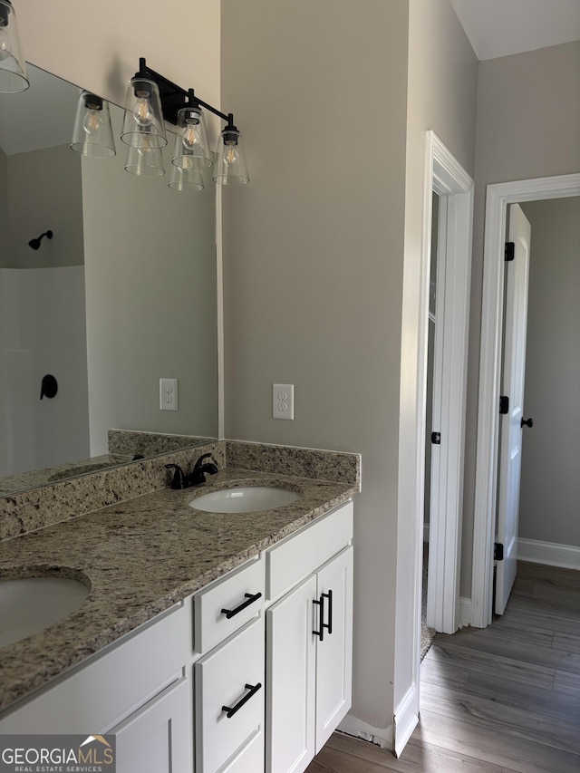 29 Iron Bound Trl, Dallas, GA 30132 - full bath with double vanity, wood finished floors, and a shower