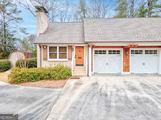 view of front of property featuring a garage