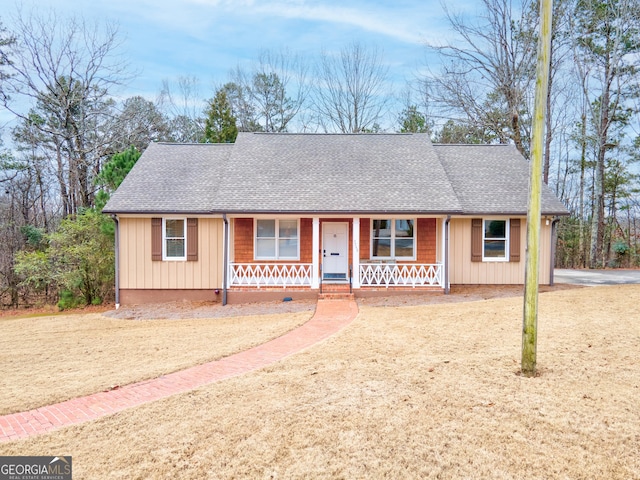 ranch-style home featuring covered porch