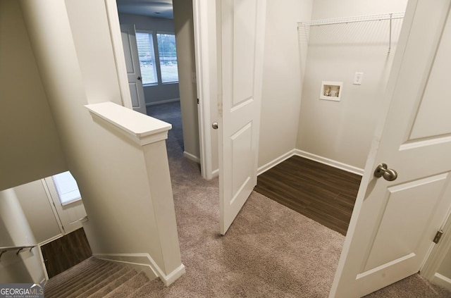 laundry area featuring hardwood / wood-style flooring and washer hookup