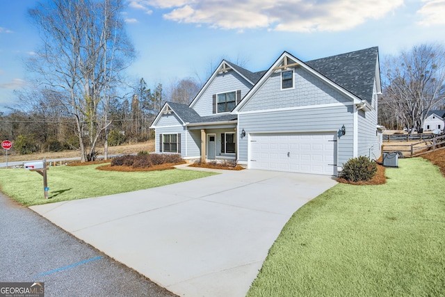 craftsman-style home with a garage and a front yard