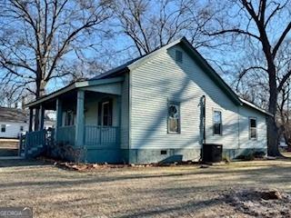 view of home's exterior featuring a porch