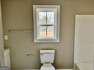 bathroom with vanity and toilet