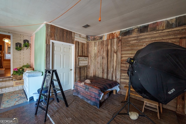 office space featuring wood walls