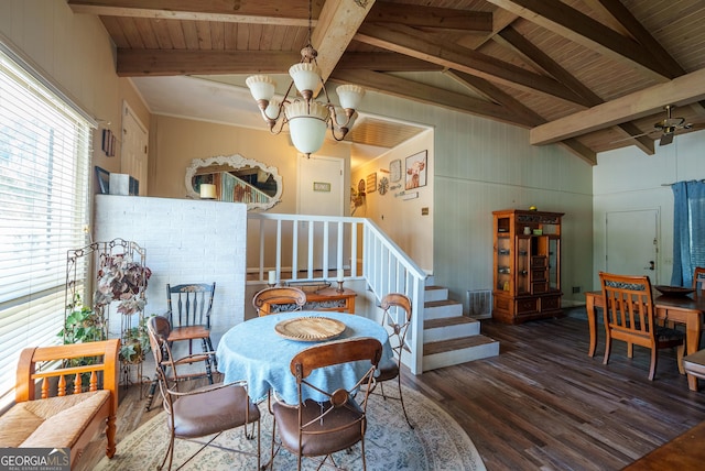 dining space with vaulted ceiling with beams, wood ceiling, dark wood-type flooring, and a chandelier