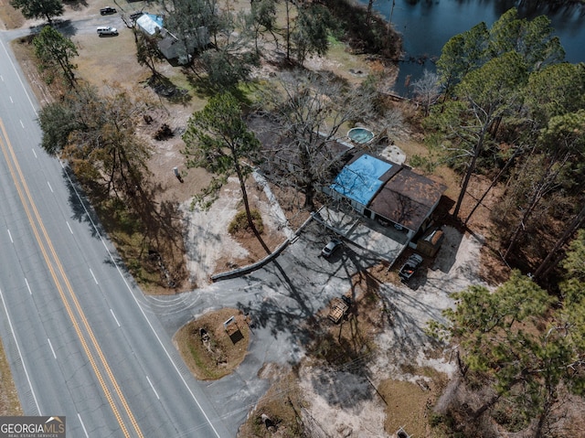 drone / aerial view with a water view