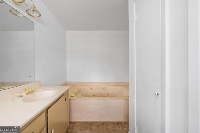 bathroom with vanity and a washtub