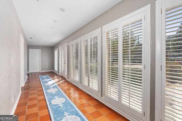 hall featuring tile patterned floors