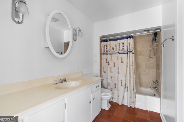 full bathroom featuring shower / tub combo with curtain, vanity, tile patterned floors, and toilet