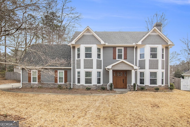 view of front facade with a front lawn