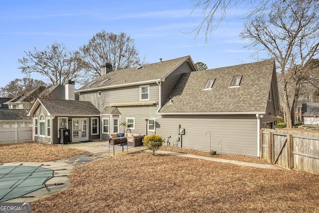 back of property featuring a patio