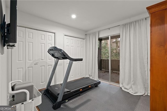 workout area featuring carpet flooring