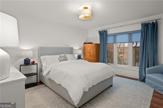 bedroom featuring wood-type flooring