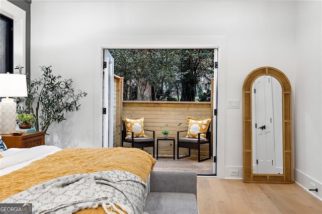 bedroom with light hardwood / wood-style flooring