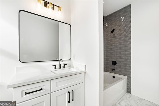 bathroom with vanity and tiled shower / bath combo