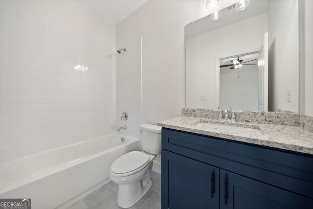 full bathroom featuring ceiling fan, tiled shower / bath combo, vanity, tile patterned floors, and toilet