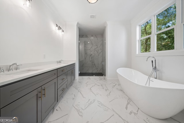 bathroom with ornamental molding, vanity, and plus walk in shower