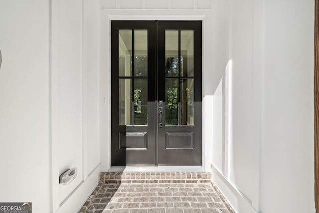 doorway to property featuring french doors