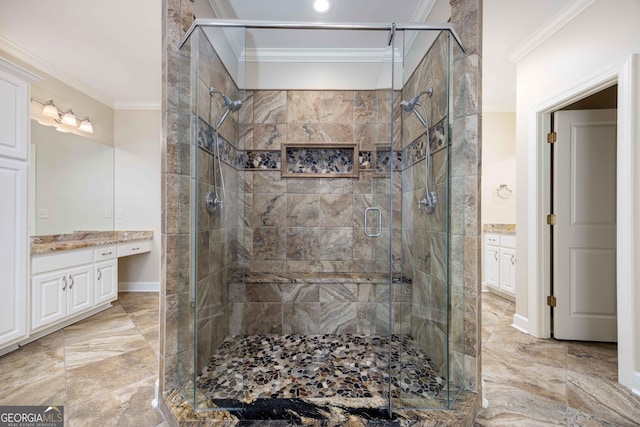 bathroom featuring vanity, an enclosed shower, and crown molding