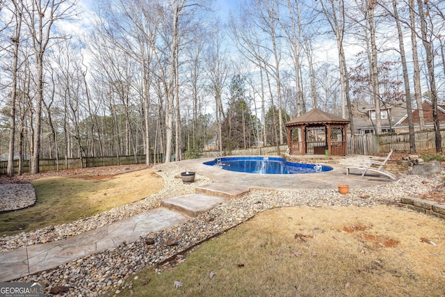 view of swimming pool featuring a gazebo