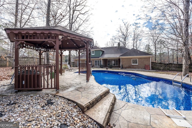 view of pool featuring a gazebo and a patio area