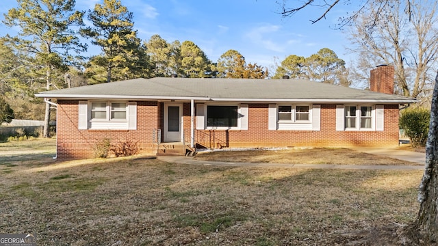 ranch-style house with a front yard