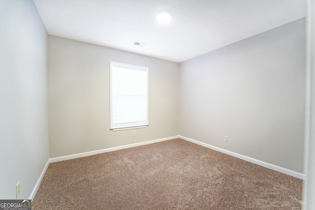 spare room with carpet flooring