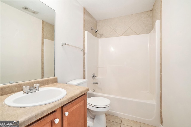 full bathroom with tile patterned flooring, vanity, tub / shower combination, and toilet