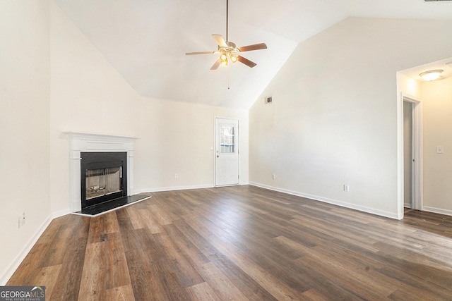 unfurnished living room featuring high vaulted ceiling, dark hardwood / wood-style floors, and ceiling fan