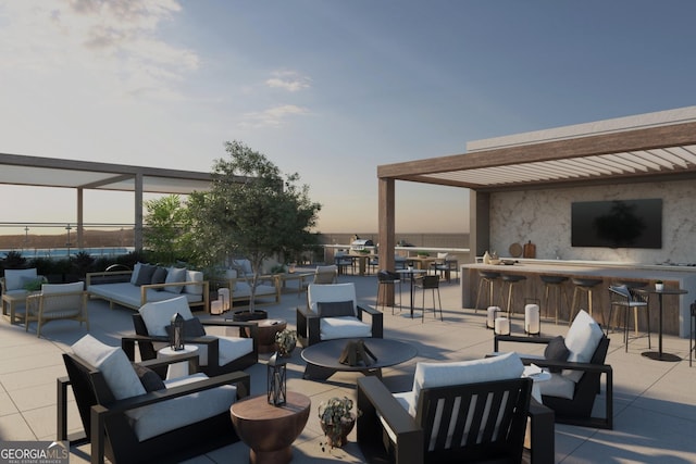 view of patio with glass enclosure, an outdoor living space with a fire pit, and an outdoor bar
