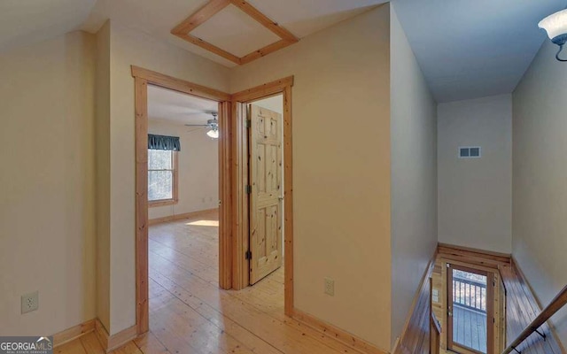 hall featuring light hardwood / wood-style flooring