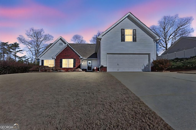 front of property with a garage