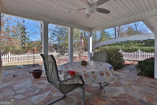 view of patio featuring ceiling fan