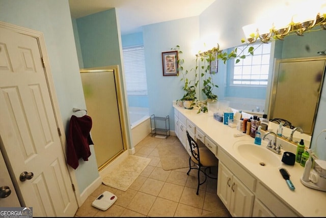 bathroom featuring plus walk in shower, tile patterned floors, and vanity