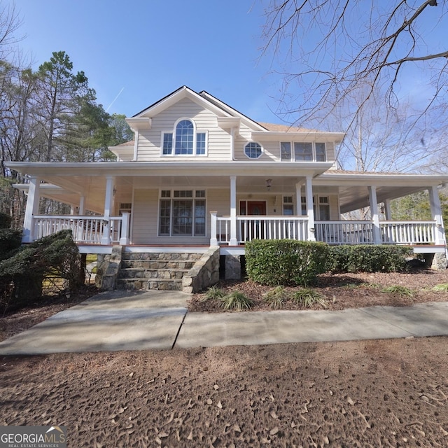 farmhouse-style home featuring a porch