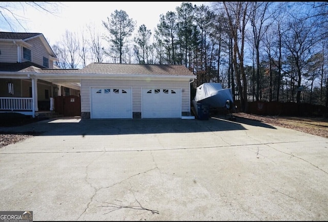 view of side of home featuring covered porch