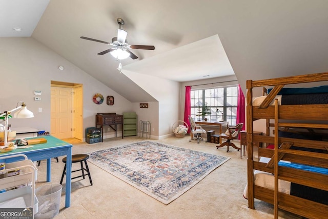 carpeted bedroom with vaulted ceiling